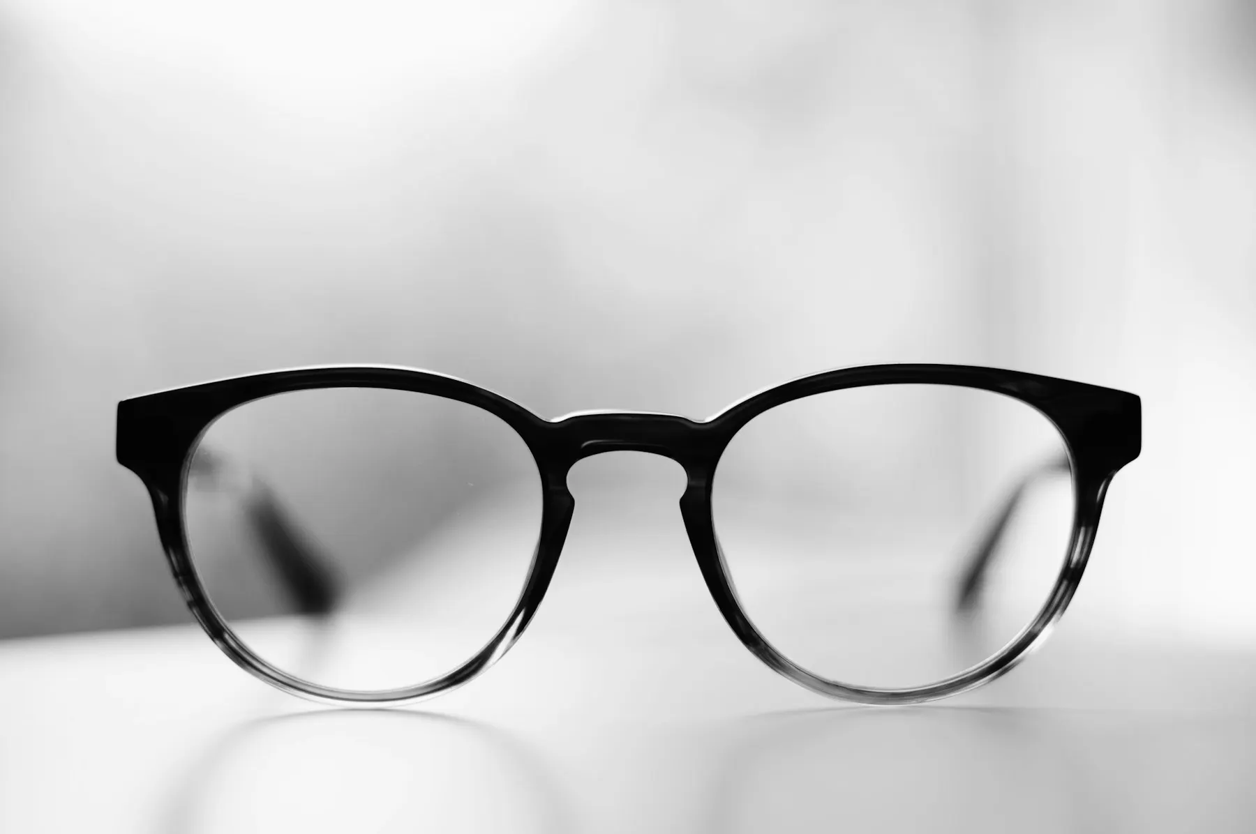 Finished glasses with coated lenses
